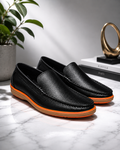 Classic Black Leather Slip-On Loafers with Contrast Orange Sole