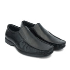 Black formal slip-on with moccasin stitching and ribbed sole: