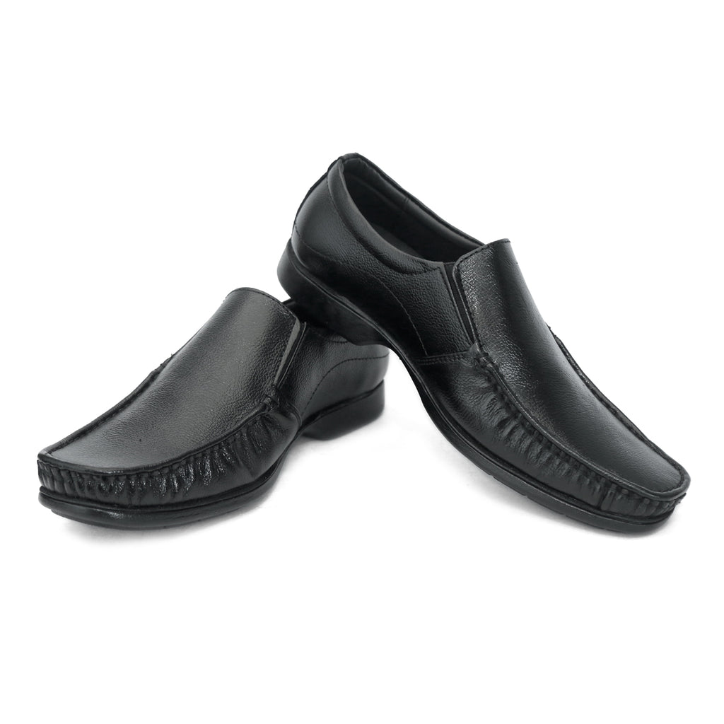 Black formal slip-on with moccasin stitching and ribbed sole: