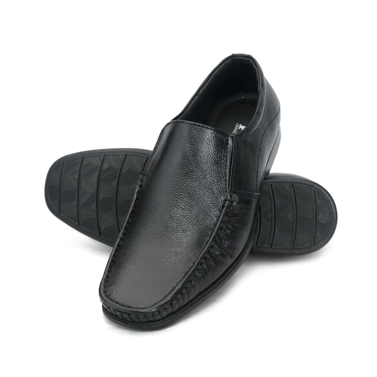 Black formal slip-on with moccasin stitching and ribbed sole: